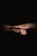 © Юрий Горид - human hands with anime gestures on a black background