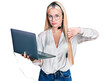 Beautiful blonde woman working with laptop wearing operator headset with angry face, negative sign showing dislike with thumbs down, rejection concept