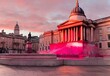 Crimson Canvas: Trafalgar Square Bathed in Evening Glow
