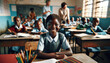 © SpeedShutter - Smiling African girl sitting at a desk in the school classroom.Elementary or Primary school age.