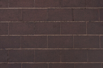 Sticker - Reddish stone tile on pavement outdoor