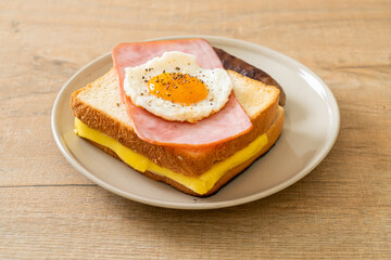 Poster - bread toasted cheese topped ham and fried egg with pork sausage