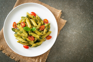 Canvas Print - penne pasta with pesto sauce and tomatoes