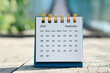 September 2024 white calendar with green blurred background. New year concept.