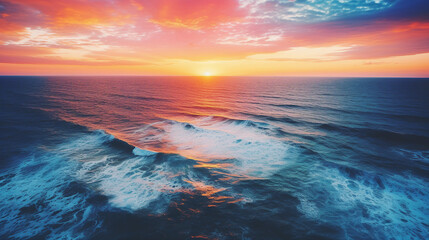 Poster - Aerial View of Coastal Sunset with Vibrant Colors Background