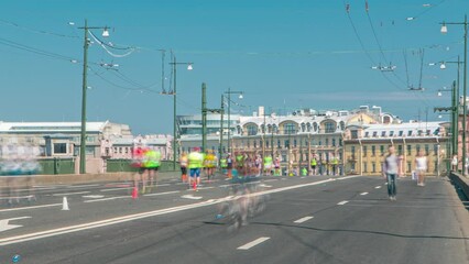 Wall Mural - Birzhevoy Bridge Marathon Timelapse - XXVII International Marathon in Saint Petersburg, Russia. Runners Participating on the Bridge