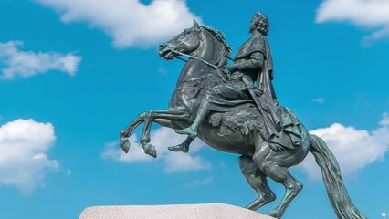 Sticker - Bronze Horseman Monument Timelapse in Saint Petersburg, Russia. Majestic View of Russian Emperor Peter the Great Statue with Blue Cloudy Sky and Green Trees as Background