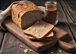 Crispy bread on a dark brown old wooden board. Gray bran bread sliced on a wooden board.
