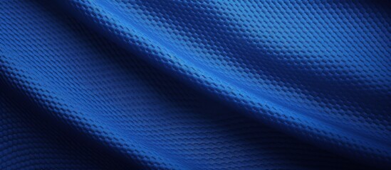 texture of football jersey fabric in blue with stitched details copy space image place for adding te