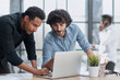 © Katsiaryna - Corporate Professionals Embracing Collaboration in office