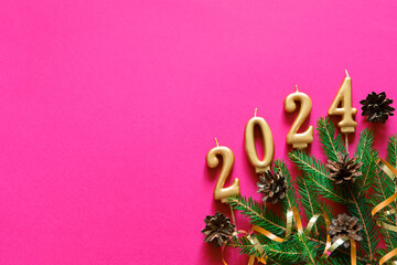 Wall Mural - pink christmas background. top view photo of christmas tree branches and cones with empty space. chr