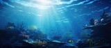 Fototapeta Do akwarium - Underwater seascape with sunbeams and marine life. Ocean exploration and beauty.