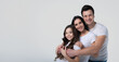 © My Ocean studio - Close up photo of beautiful and smiling family team is posing in a white t-shirt while they isolated on white background in studio.