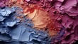
A vivid canvas of crushed eyeshadows in shades of blue, beige, pink, and red, creating a dynamic and textured mosaic of makeup pigments