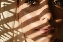  A Close-up Of An Woman's Face, With A Shadow Of The Palm Tree Leaves Creative Summer Holiday  Fashion Editorial Concept.