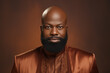 bussinesman, A modern and elegant bald afroman, with a beard, 48 years old. light colored background