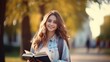 © pinkrabbit - Beautiful student woman with backpack and books outdoor. Smile girl happy carrying a lot of book in college campus. Portrait female on international University. Education, study, school