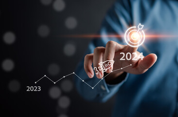 Pointing Happy New year 2024 with chart graph and countdown merry christmas and happy new year, Planning and challenge strategy business in new year 2024 Concept.