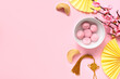 © Pixel-Shot - Bowl of tangyuan, fortune cookies, Chinese decor and sakura on pink background. Dongzhi Festival