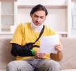 © Elnur - Young man after car accident suffering at home