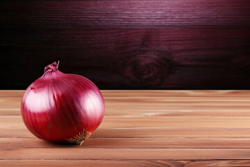 red onion on wooden table with copy space