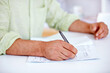 © ArcursJointTeam/peopleimages.com - Closeup, hands and entrepreneur with man, contract and professional with information, paperwork and signing. Person, employee and guy with documents, office and agreement with b2b deal and writing