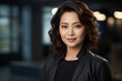 Portrait of an Asian professional consultant woman with a confident and engaging expression. Dressed in formal business attire, symbolizing her expertise and professionalism
