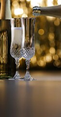 Wall Mural - Champagne Toast Celebration. Happy New Year With Golden Glitter And Defocused Bokeh Lights
