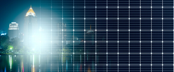 Wall Mural - solar panels surface and night city. power supply.electricity. renewable energy clean energy and env