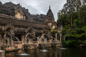 Wall Mural - Beautiful ancient Asian architecture. Stone elephants. It's a nasty day.