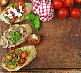 Poster - assorted bruschetta with tomatoes, mushrooms and cheese