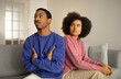 African couple faces marriage crisis sitting in sulking silence indoors