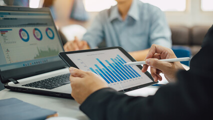 Two businessman consult analyzing company financial cash flow result. Concept for teamwork business meeting corporate and economy fund.