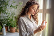 © Hunman - Body Care. Woman Applying Moisturizing Lotion Or Cream Caring For Skin At Home.