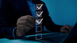 © TStudious - Businessman tick correct mark to approve document iso checklist icon.checkmark quality management quality assurance or QA and quality control or QC and improvement, Standardization and certification.