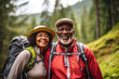 © Dinara - An active elderly couple is traveling through the forest. Mature people enjoying and having fun