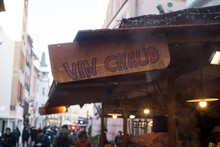 Mulhouse - France - 3 December 2023 - Closeup Of Mulled Wine Sign On Wooden Cabin At The Christmas Market With Text In French : Vin Chaud, Traduction In English Of Mulled Wine