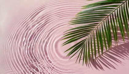 Wall Mural - summer creative layout with palm tree leaf shadow and pastel pink water ripple background 80s or 90s retro aesthetic fashion idea minimal tropical summer idea