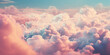 pink and white fluffy clouds in sky, light teal and light amber