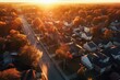 A stunning aerial view of a neighborhood at sunset. 