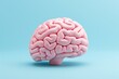 © Ева Поликарпова - A pink model of a brain placed on a blue background. This image can be used to depict concepts related to neuroscience, psychology, medical research, and brain health