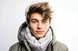 © MagnusCort - A young man wearing a hat and scarf looks at the camera