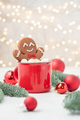 Wall Mural - Gingerbread cookie man in a hot chocolate.