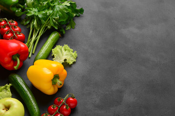 Wall Mural - Different fresh vegetables and parsley on black background