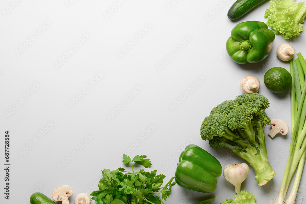 Fresh vegetables, fruits and mushrooms on white background