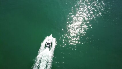 Wall Mural - Ocean cruise, travel boat and drone aerial view of trip, outdoor ride or sailing for nature freedom, yachting or transportation. Holiday background, sea waves and speedboat journey on yacht adventure