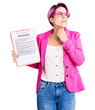 Young beautiful woman with pink hair holding clipboard with contract document touching painful neck, sore throat for flu, clod and infection