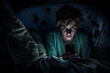 © Surachetsh - boy face is illuminated as he focuses on the screen while lying in bed with the lights off. This evocative image captures the modern digital experience. Generative AI.