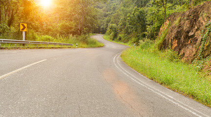 Wall Mural - Asphalt road on mountain at colorful sunrise in summer. Road to mountains