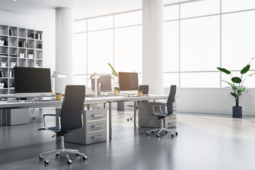 Poster - Modern coworking office interior with bookcases, panoramic windows and city view, furniture, equipment and computer monitors. 3D Rendering.